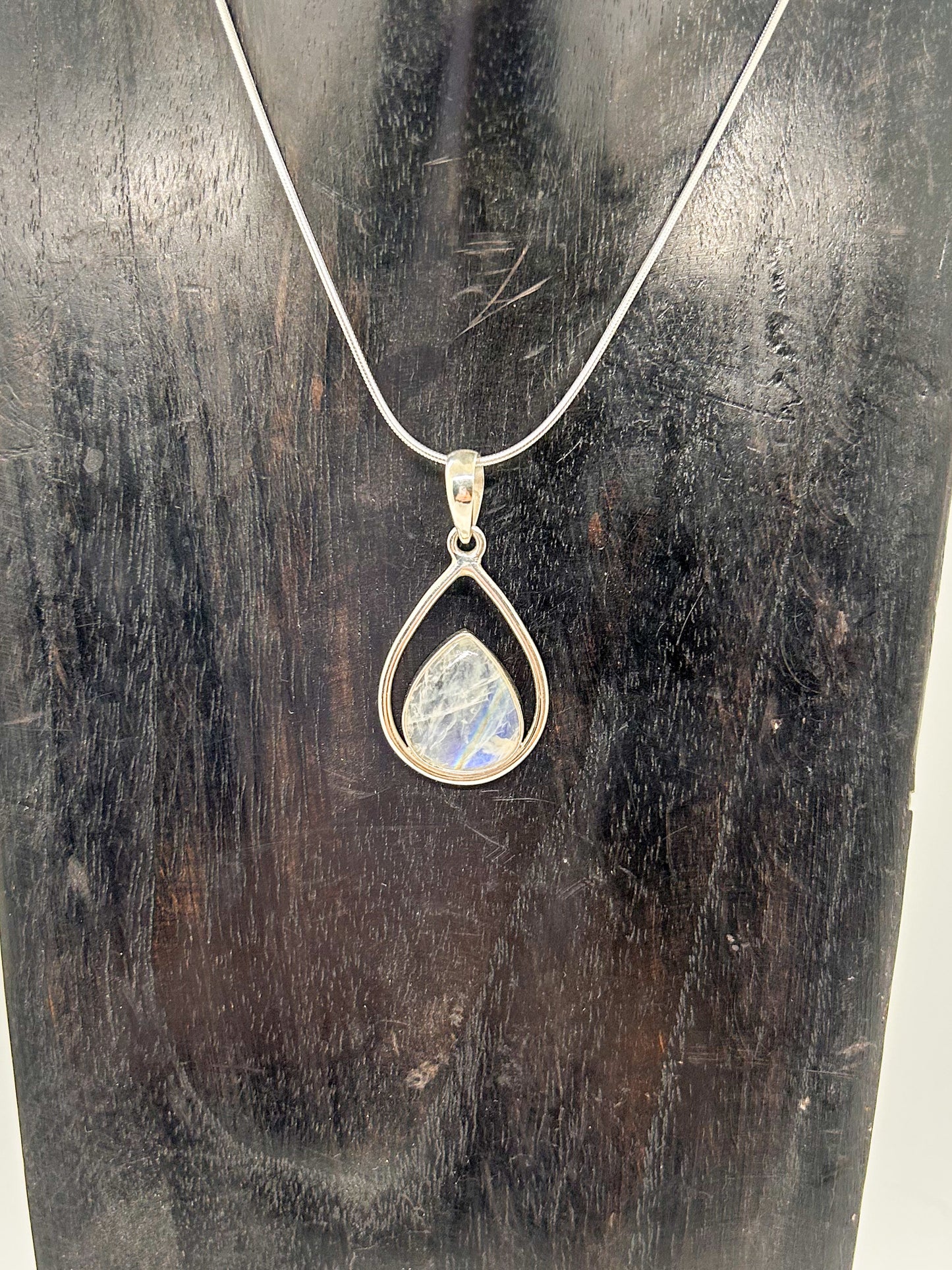 Moonstone Teardrop Enveloped in Silver