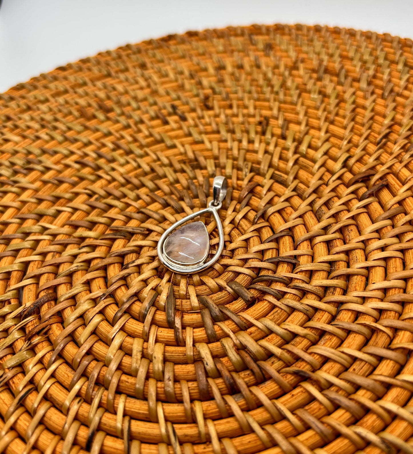 Moonstone Teardrop Enveloped in Silver