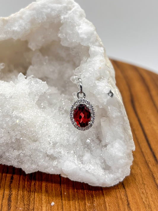 Oval Garnet Wrapped in Cubic Zirconia