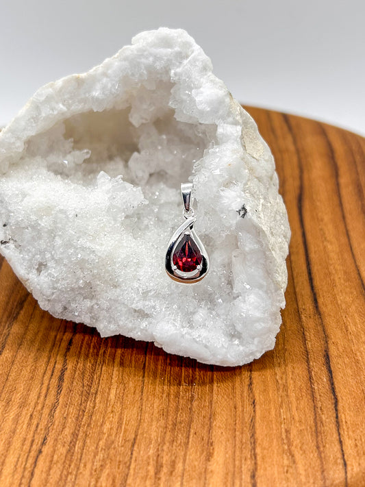 Faceted Garnet Teardrop Encased in Silver